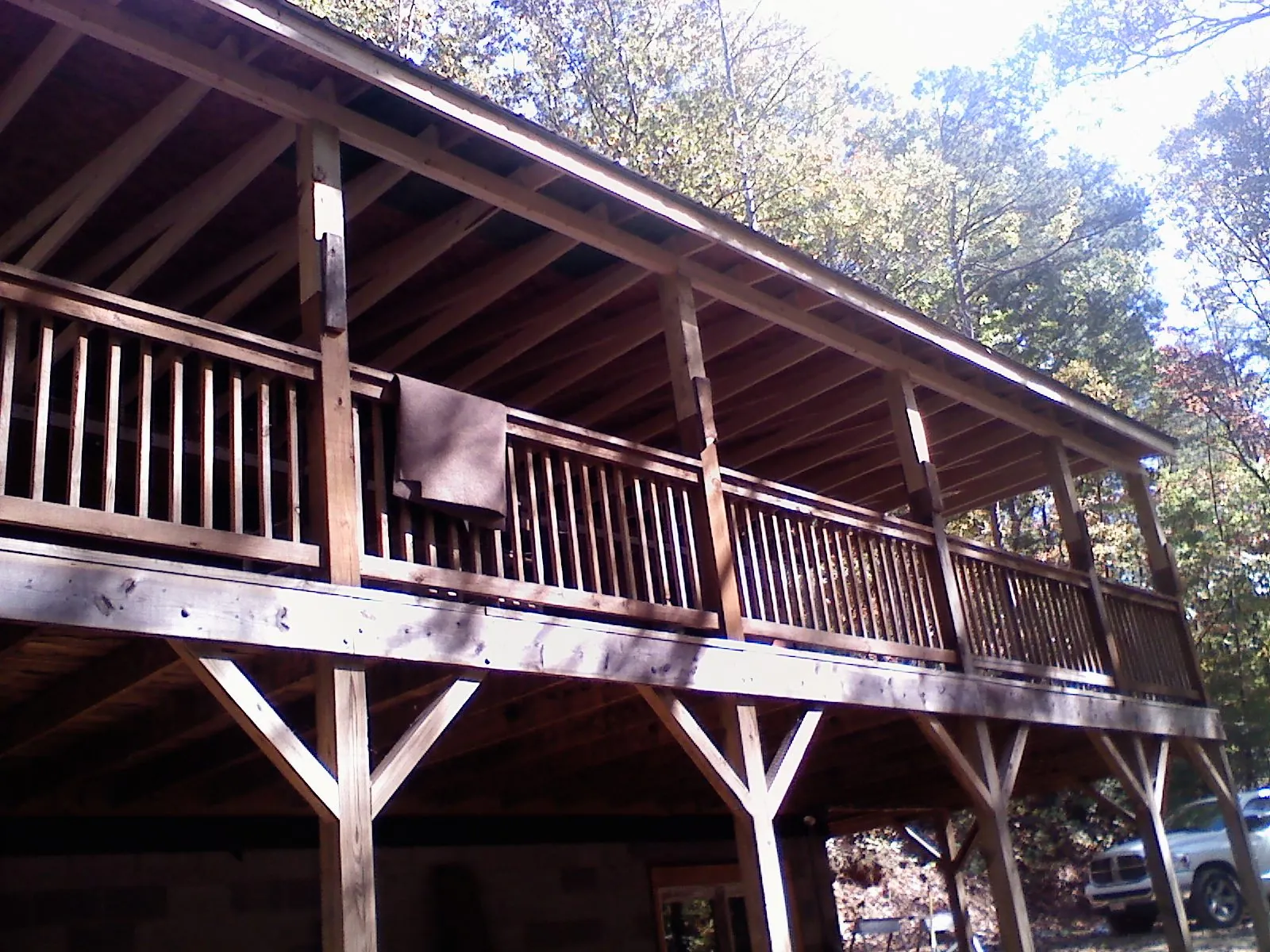 Timber framing under a new elevated porch and deck — Roof Leak Repair in Voorheesville by Roofing Brothers